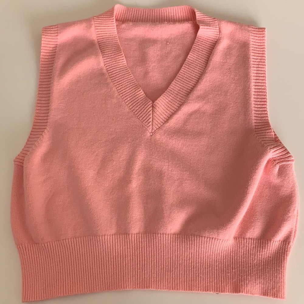 Pink sweater vest